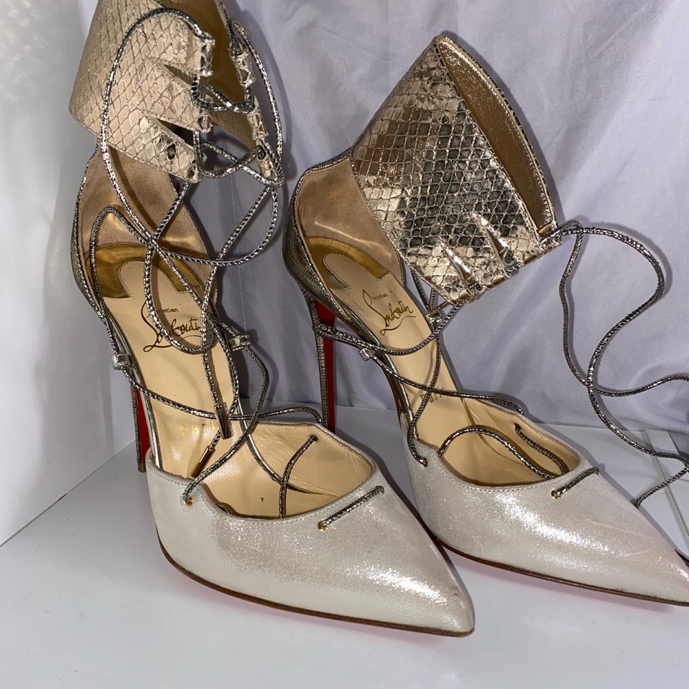 Red Bottom heels, Christian Louboutin Corsankle
Lace up Gold Pump